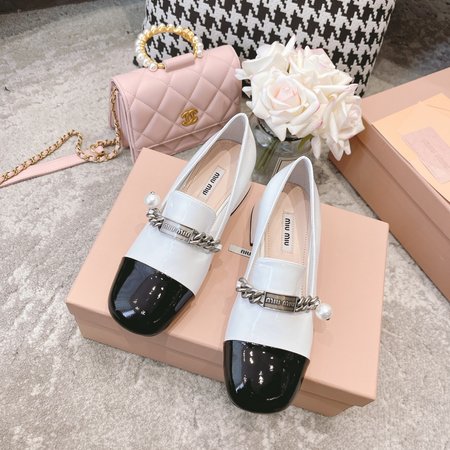 Miu Miu reflective loafers
