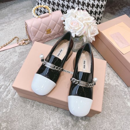 Miu Miu reflective loafers