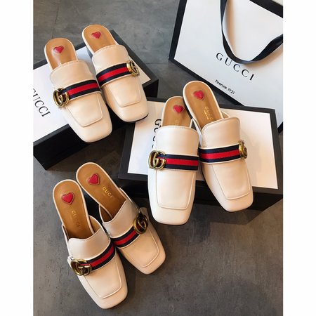 Gucci Calfskin slippers with GG buckle