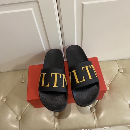 Valentino Slippers VLTN letters in sheepskin