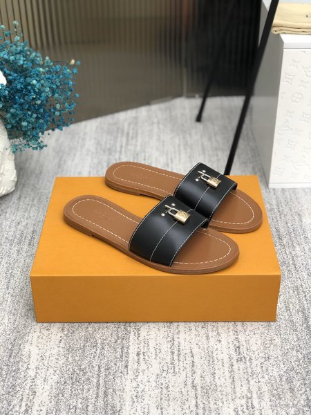 Louis Vuitton Lock It slippers Monogram metal monogram clasp