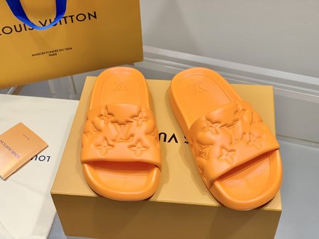 Louis Vuitton Embossed beach sandal slides