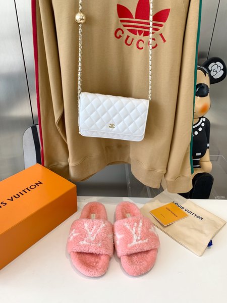 Louis Vuitton teddy fur slippers