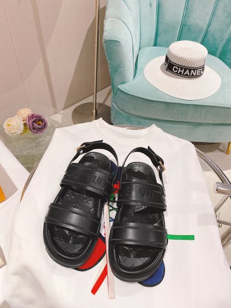 Louis Vuitton Embossed slide sandals