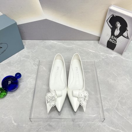 Prada Women s flat shoes with pointed toe and empty back flowers